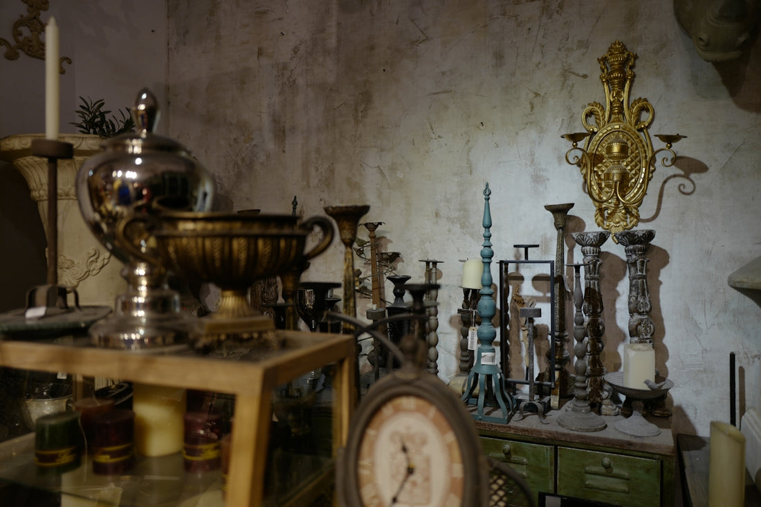 gold and black analog clock on brown wooden table