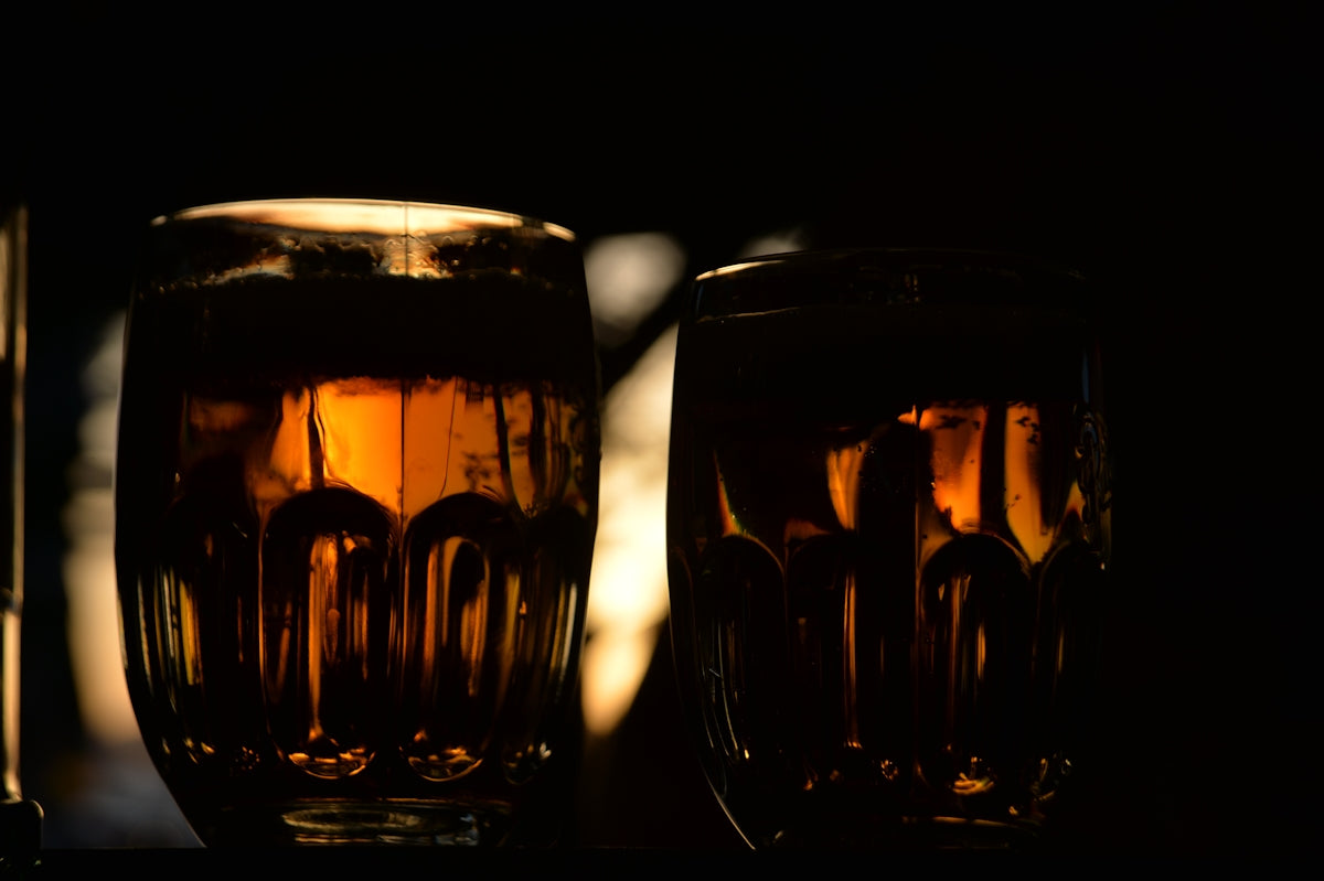a couple of glasses that are sitting on a table